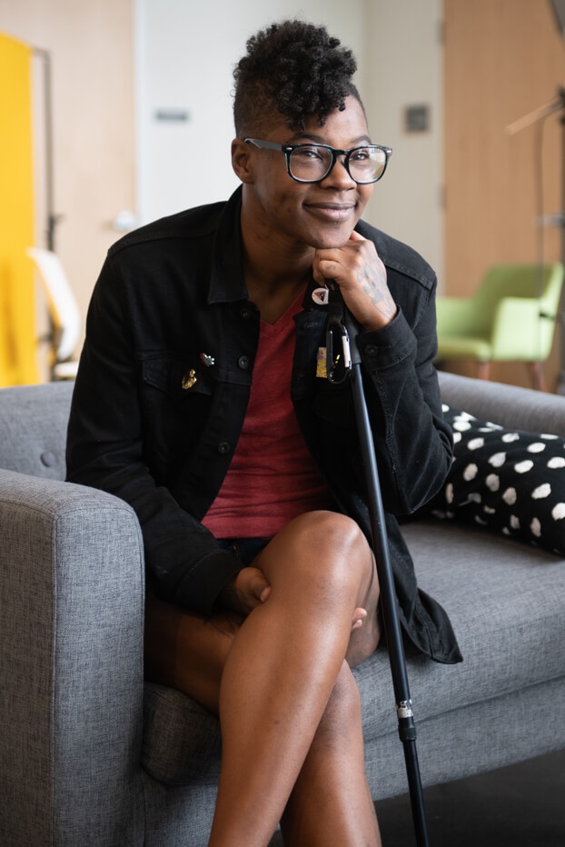 Roux sitting on couch